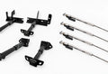 F2031 front and F3008 rear camper tie downs beside four polished S9526 Original FastGun turnbuckles on a light background.
